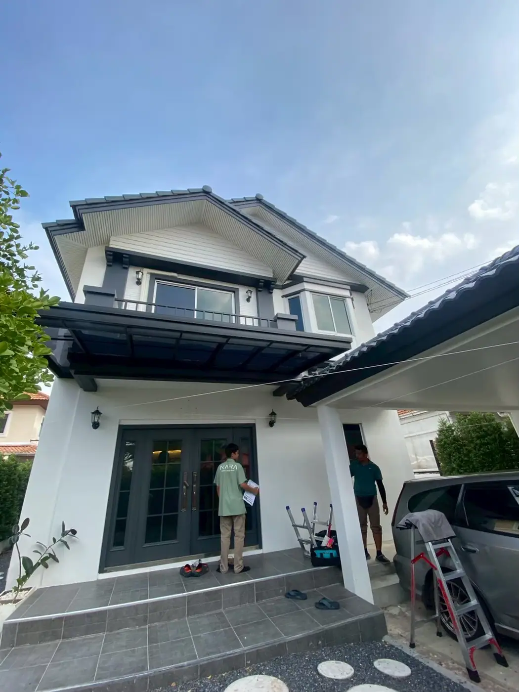งานติดฟิล์มกรองแสงที่ หมู่บ้านชวนชื่นวัชรพล รูปที่ 2