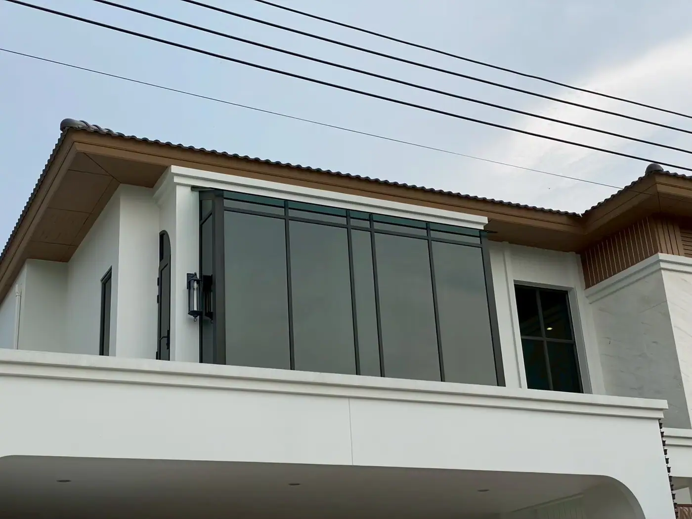 งานติดฟิล์มกรองแสงที่ หมู่บ้านนิรดา ถ.อักษะ รูปที่ 5