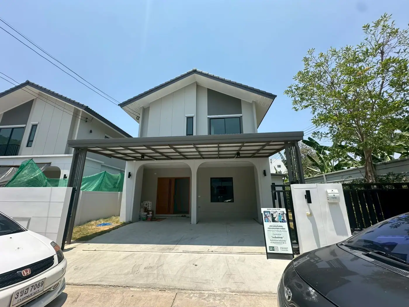 งานติดฟิล์มกรองแสงที่ หมู่บ้านมิตติ ลำลูกกา รูปที่ 2